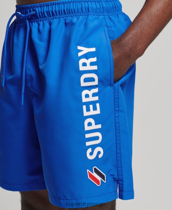 Superdry blå klær 86P46D433 19 tommers resirkulerte badeshorts med applikasjoner menn