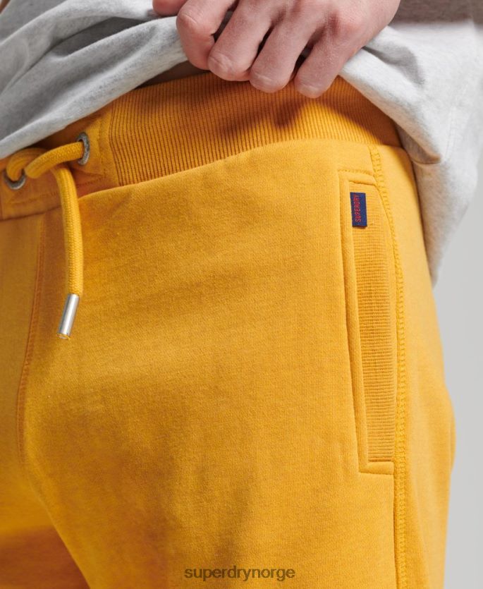 Superdry gul klær 86P46D363 jerseyshorts med vintage logo i økologisk bomull menn